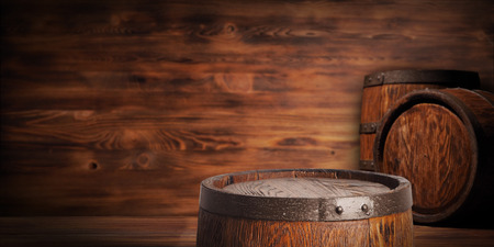 Rustic wooden barrel on a night background.の写真素材