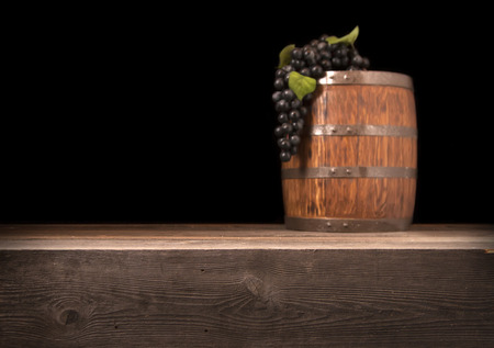 Rustic blurred wooden barrel on a night background.の写真素材