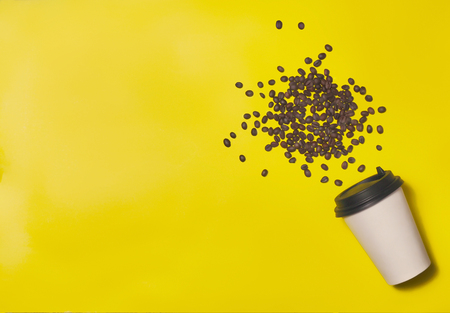 Paper coffee container on color background. Template of drink cup for your design. Can put text, image, and logo.の写真素材