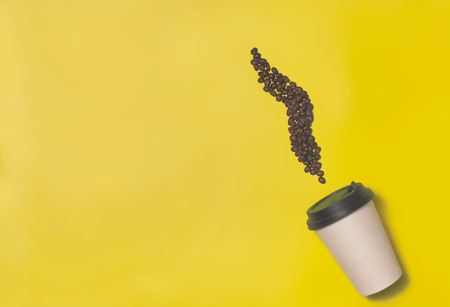 Paper coffee container on color background. Template of drink cup for your design. Can put text, image, and logo.の写真素材