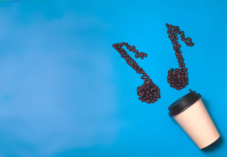 Paper coffee container on color background. Template of drink cup for your design. Can put text, image, and logo.の写真素材