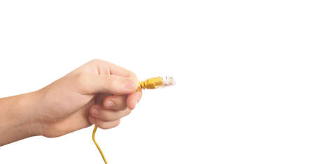 Computer cable and hand isolated on white background. Internet support concept.の写真素材