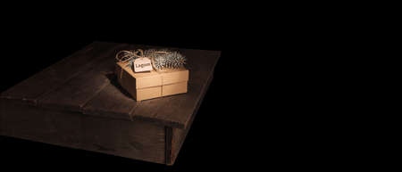 Lagom, Swedish concept of balanced lifestyle. Christmas craft box on a rustic table.