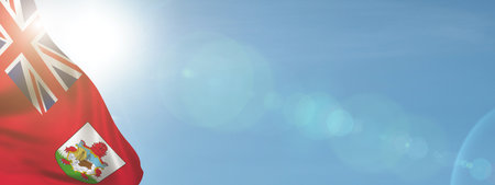 Flag of Bermuda on sky background. National holiday concept. British Commonwealthの写真素材