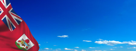 Flag of Bermuda on sky background. National holiday concept. British Commonwealthの写真素材