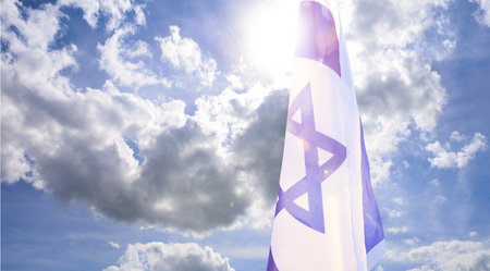 Flag of Israel on blue sky background. National holiday concept. 3d illustration