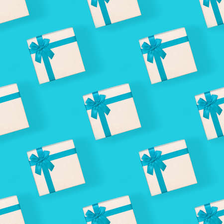 seamless pattern in the form of a blue background with gift boxes. Backgroundの写真素材