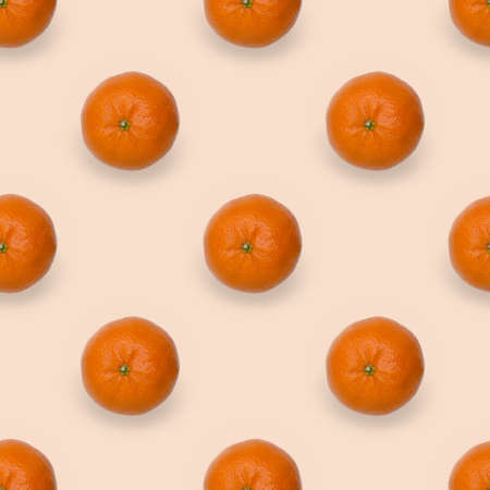 on a light background mandarin, seamless pattern, background. view from above.