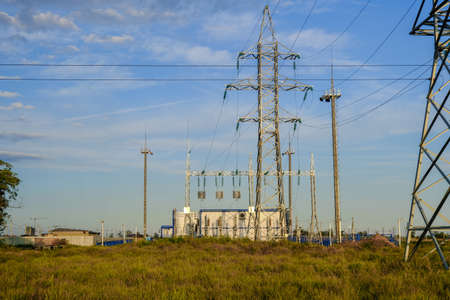 small electrical substation in the field against the blue sky. Horizontal photoの写真素材