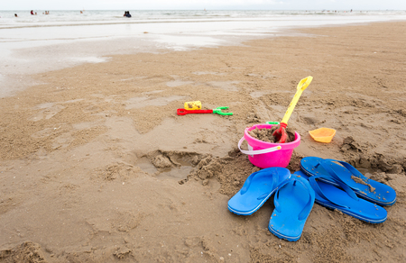 Kids toys on tropical sand beachの写真素材