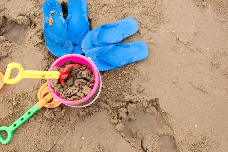 Kids toys on tropical sand beachの写真素材