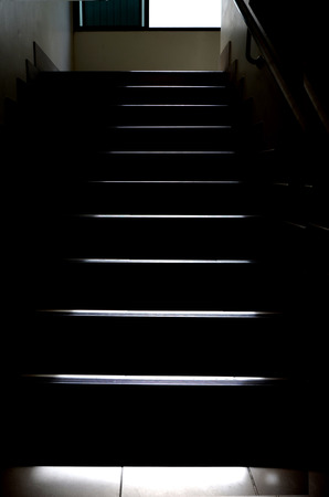 light on stairs white in the dark.の写真素材