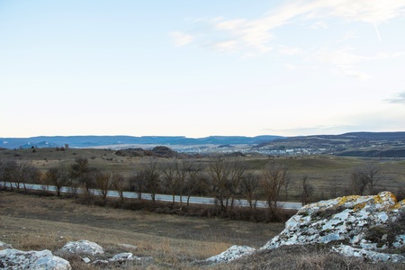On the way in Ukraine plain in sunsetの写真素材