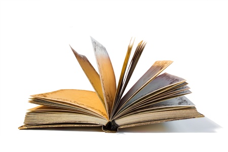 Old yellow notebook isolated on white backgroundの写真素材