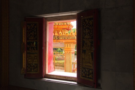 Open window in a old Buddhist temple, Asia, Thailandの写真素材