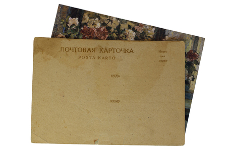 Old rusty Postcard isolated on white backgroundの写真素材