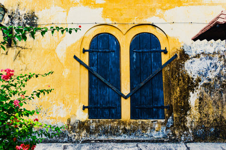 Galle, Sri Lanka - architecture. Blue door on an ancient beige wallの写真素材