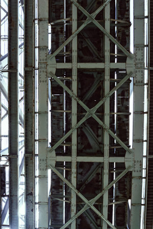 Beneath the Industrial Bridge, a captivating scene shows intricate designs of engineering