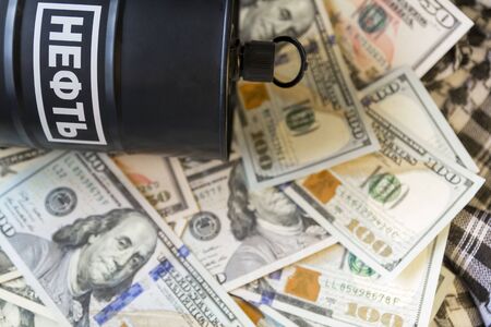 Business dialogue, oil agreement concept: concept. Selective focus. Artwork decoration.War on oil market.Sale of oil. Oil market. Focus on dollars banknots.の写真素材