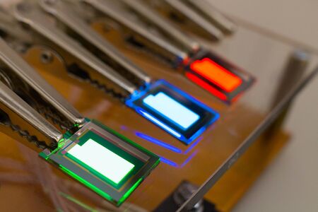 Checking turn on small tiny oled display on probe station red , green , blue...