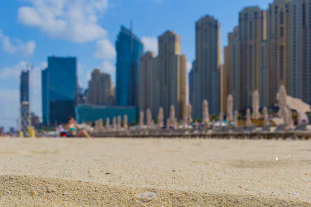 UAE, DUBAI - 5 March 2019 Beach and skyscrapers at Jumeirah beach in Dubai marina.UAEのeditorial素材