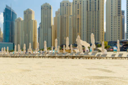 UAE, DUBAI - 5 March 2019 Beach and skyscrapers at Jumeirah beach in Dubai marina.UAEのeditorial素材