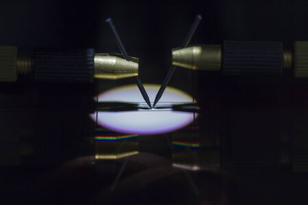 Checking microchips on silicon wafer with probe station.Close up . Semiconductor Crystal Manufacturing.Selective focus.の写真素材