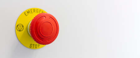 The red button of machine emergency stop on gray backround. Copy space.の写真素材
