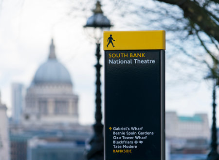 National Theatre sign and St. Paul's cathedral LONDON, ENGLAND - FEBRUARY 22, 2016のeditorial素材