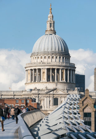 St. Paul's cathedral London and Millennium Bridge over River Thames LONDON, ENGLAND - FEBRUARY 22, 2016のeditorial素材