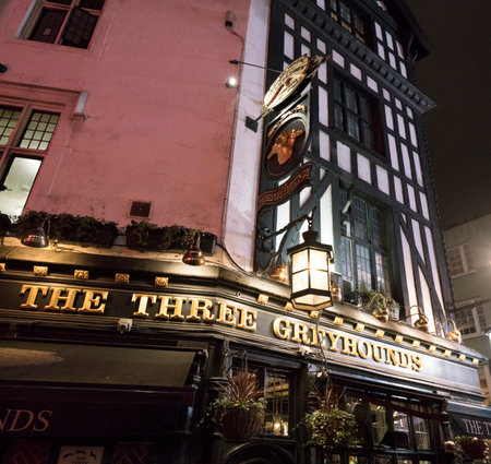 Traditional English Pub The Three Greyhounds in London SOHO district LONDON, ENGLAND - FEBRUARY 22, 2016のeditorial素材