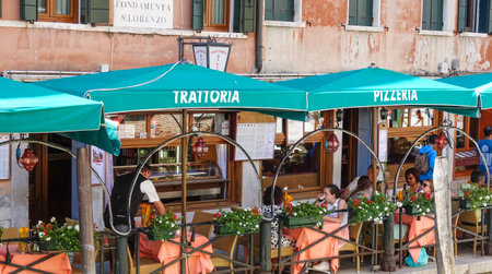 Small trattoria and pizzeria at the Grand Canal in Veniceのeditorial素材