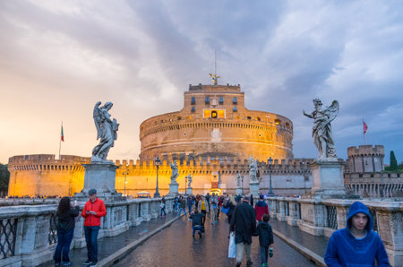 Tourists walking over Angels Bridge in Rome to Castel Sant Angelo - ROME, ITALY - NOVEMBER 5, 2016のeditorial素材