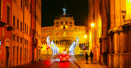 ROME / ITALY - NOVEMBER 6, 2016 - Narrow lane in the historic district of Rome with a view over Castel Sant Angeloのeditorial素材
