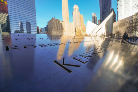 Engraved names of the victims of 9/11 at Ground Zero Memorial- MANHATTAN / NEW YORK - APRIL 1, 2017のeditorial素材