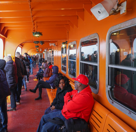 Tourists on Staten Island Ferry- MANHATTAN / NEW YORK - APRIL 1, 2017のeditorial素材