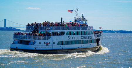 Statue Cruises - the Statue of Liberty Sightseeing boat- MANHATTAN / NEW YORK - APRIL 1, 2017のeditorial素材
