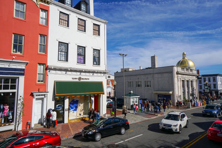 Tourists walking through Georgetown - a busy area in Washington - WASHINGTON DC - COLUMBIA - APRIL 7, 2017のeditorial素材