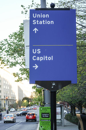 Direction signs to Union station and US Capitol in Washington DC - WASHINGTON DC - COLUMBIA - APRIL 7, 2017のeditorial素材
