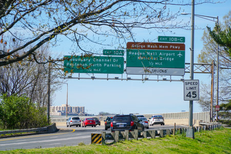 Street signs to Reagan National Airport in Washington - WASHINGTON DC - COLUMBIA - APRIL 7, 2017のeditorial素材