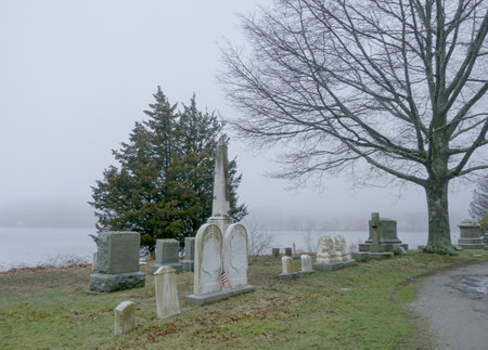 Cemetery located at Mystic River in Mystic - MYSTIC - CONNECTICUT - APRIL 6,2017のeditorial素材