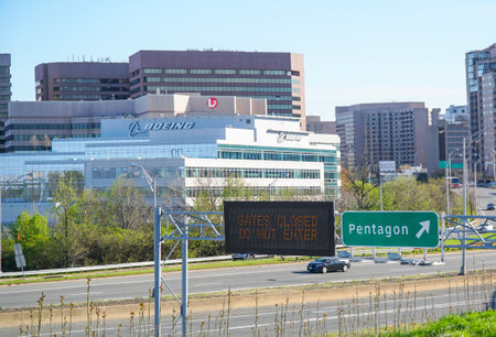 Street sign to Pentagon and Boeing Company Building - WASHINGTON, DISTRICT OF COLUMBIA - APRIL 8, 2017のeditorial素材