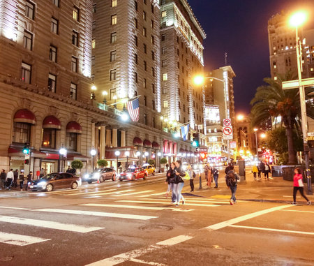 Street view in Downtown San Francisco at night - SAN FRANCISCO - CALIFORNIA - APRIL 17, 2017のeditorial素材