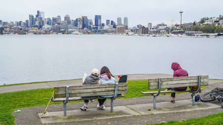 People enjoying the view from Gasworks Park in Seattle - SEATTLE / WASHINGTON - APRIL 11, 2017