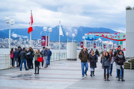 The waterfront walk at Canada Place Vancouver - VANCOUVER - CANADA - APRIL 12, 2017のeditorial素材