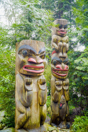 Totem Poles in Capilano Suspension Bridge Park - VANCOUVER - CANADA - APRIL 12, 2017のeditorial素材