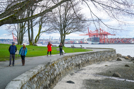 Walking through Stanley Park Vancouver - perfect place to relax - VANCOUVER - CANADA - APRIL 12, 2017のeditorial素材