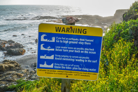 Warning sign at the coast of Shelter Cove - SHELTER COVE - CALIFORNIA - APRIL 17, 2017のeditorial素材