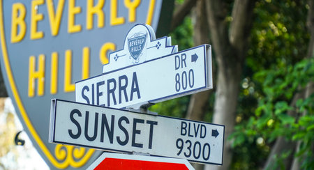 Street signs at Beverly Hills - LOS ANGELES - CALIFORNIA - APRIL 20, 2017のeditorial素材