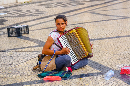 Street musician iin the pedestrian zone of Lisbon